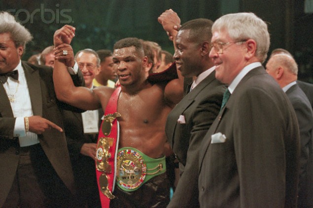 Mike Tyson Raising Arms in Victory